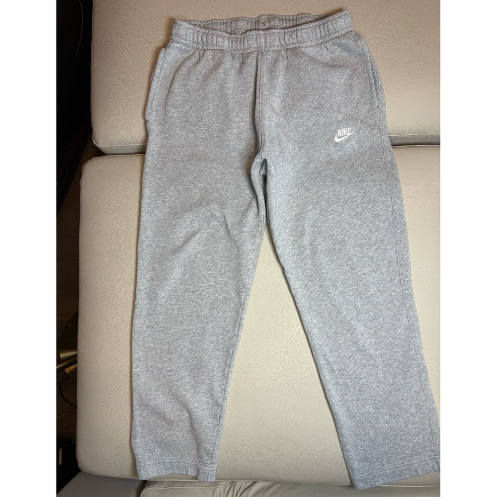 Men's large Nike Athletic Sweatpants Gray with white Nike swoosh.